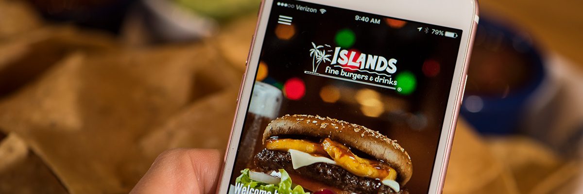 Cell Phone showing Islands Restaurants App